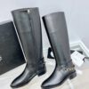 CHANEL riding boots with CC and chain at back