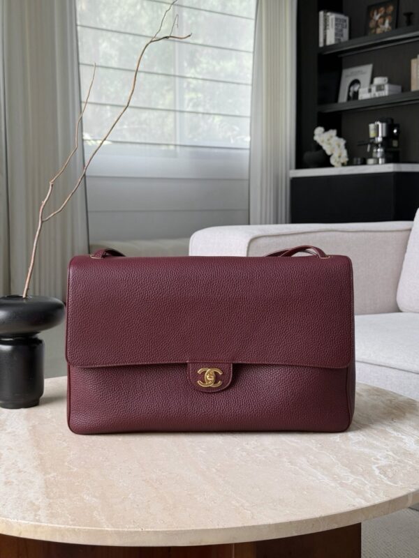 CHANEL Maxi Flap Bag Grained Calfskin In Burgundy