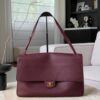 CHANEL Maxi Flap Bag Grained Calfskin In Burgundy