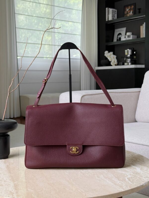 CHANEL Maxi Flap Bag Grained Calfskin In Burgundy