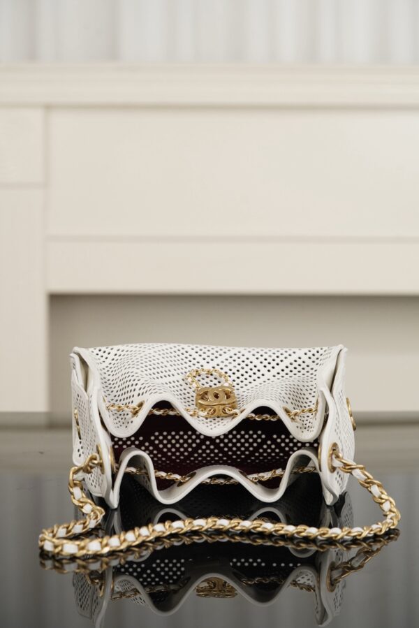 CHANEL 25 MINI Perforated Calfskin Handbag