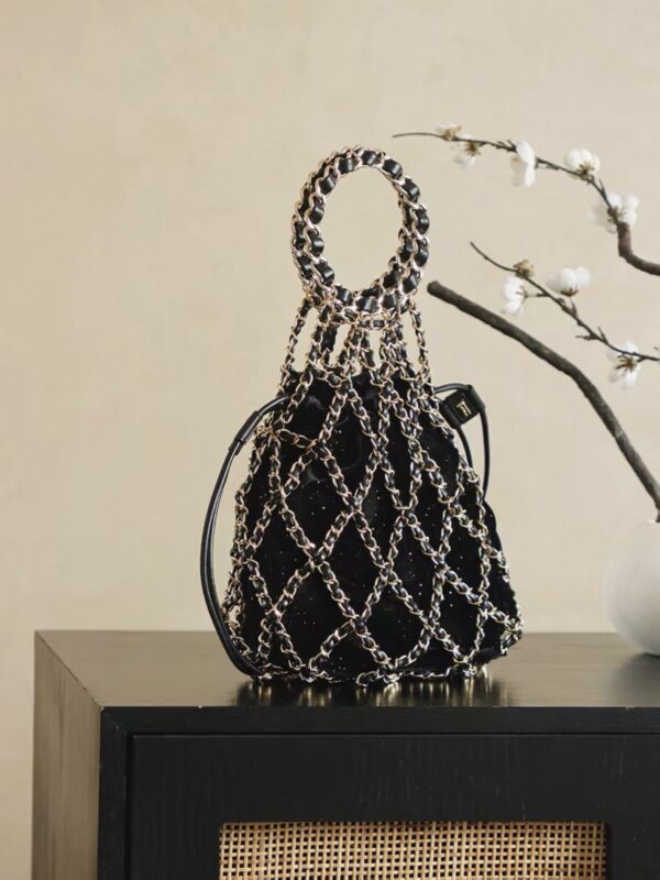 Chanel Métiers d’Art Runway black embellished tweed & leather chain link net bag with gold hardware