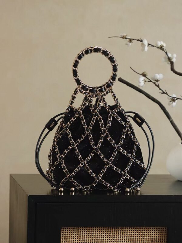 Chanel Métiers d’Art Runway black embellished tweed & leather chain link net bag with gold hardware