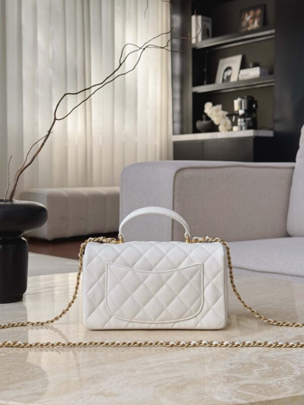 CHANEL Classic Flap Bag in quilted caviar calfskin