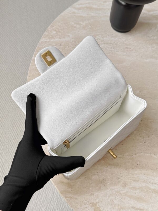 CHANEL Classic Flap Bag in quilted caviar calfskin