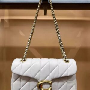 Home coach quilted tabby shoulder bag