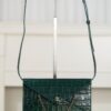 CHANEL Clutch with Leather Strap