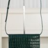 CHANEL Clutch with Leather Strap