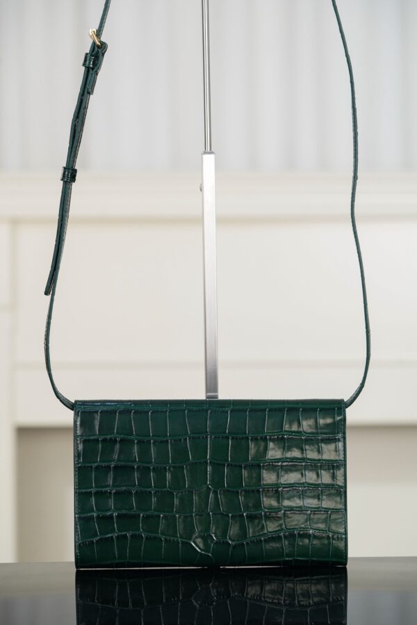 CHANEL Clutch with Leather Strap