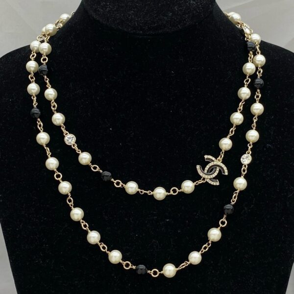 chanel pearl/black beads cc baroque sautoir necklace chanel pearl/black beads cc baroque sautoir necklace