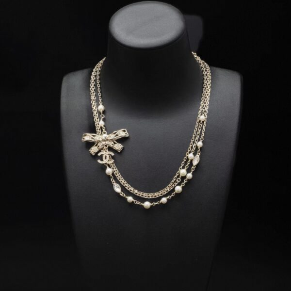 CHANEL Multi-layer bow embossing Necklace