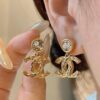 chanel pendant embossed cc earrings