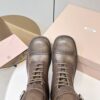 MIUMIU ace-up leather boots