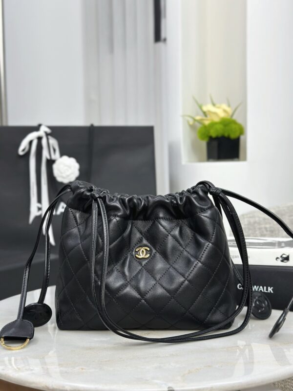 CHANEL Clutch with leather strap