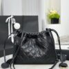 CHANEL Clutch with leather strap