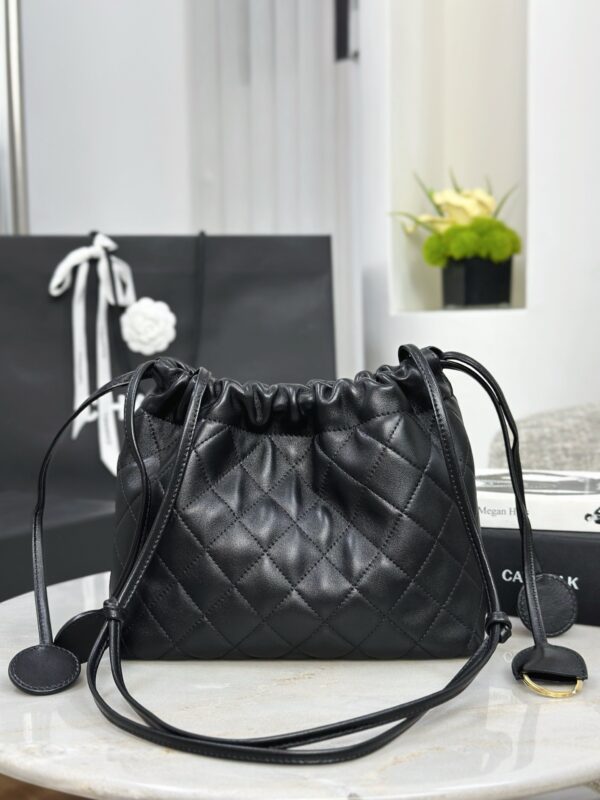 CHANEL Clutch with leather strap