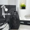 CHANEL Clutch with leather strap
