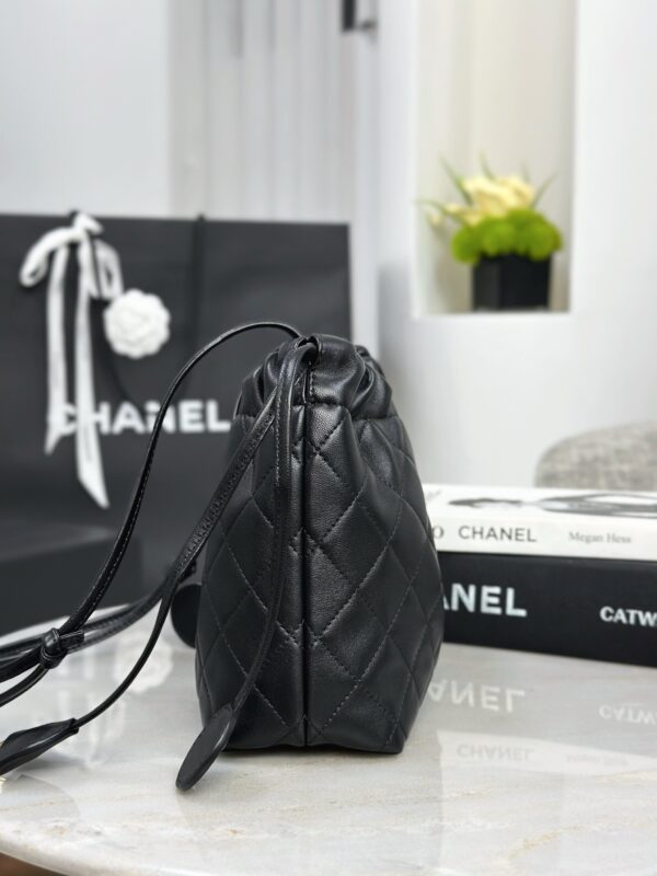 CHANEL Clutch with leather strap