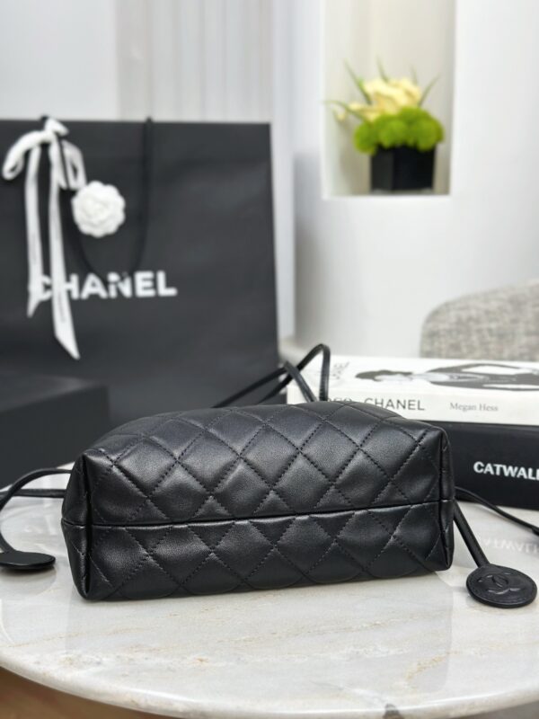 CHANEL Clutch with leather strap