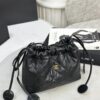 CHANEL Clutch with leather strap