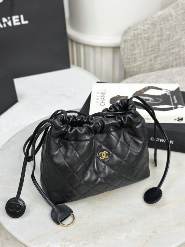 CHANEL Clutch with leather strap