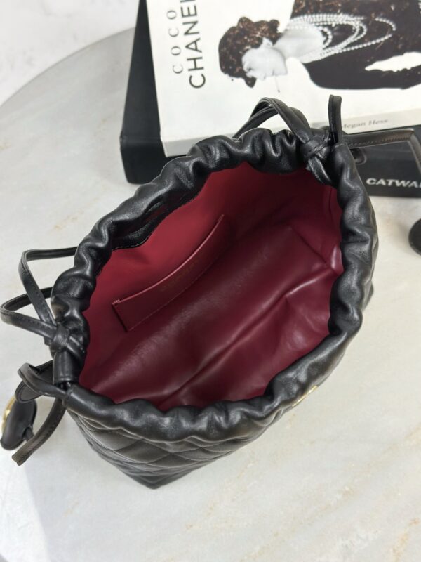 CHANEL Clutch with leather strap