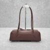 ALAIA LE TECKEL MEDIUM BAG IN CALFSKIN