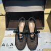 ALAIA BALLET FLATS IN FISHNET
