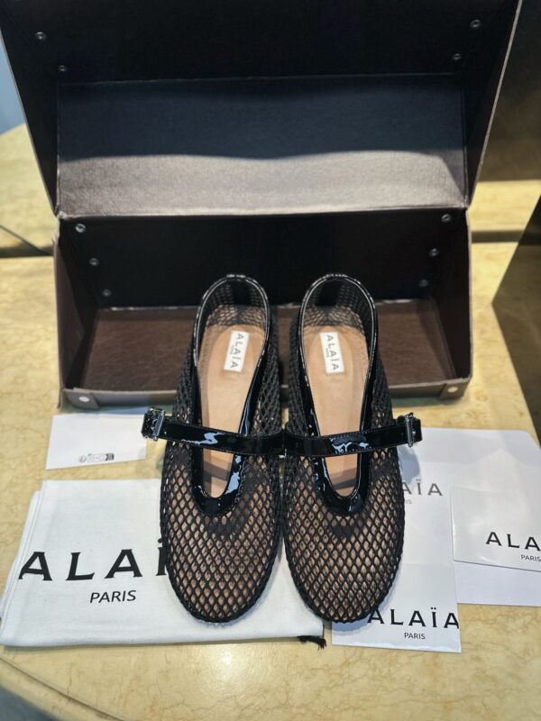 ALAIA BALLET FLATS IN FISHNET