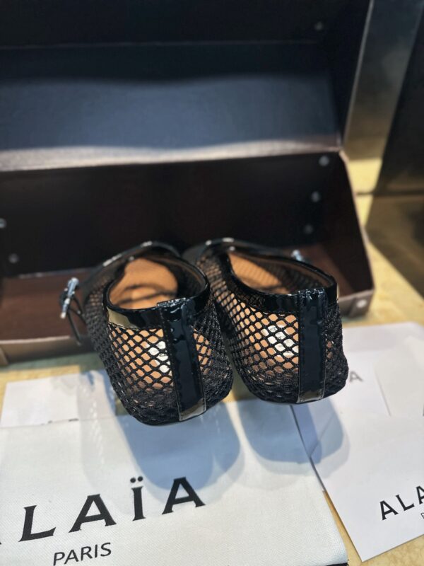 ALAIA BALLET FLATS IN FISHNET