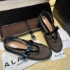 ALAIA BALLET FLATS IN FISHNET