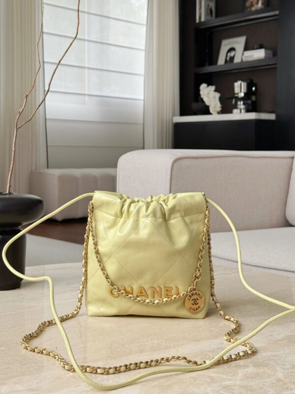 CHANEL Shiny Calfskin Quilted Mini 22 In Chick Yellow