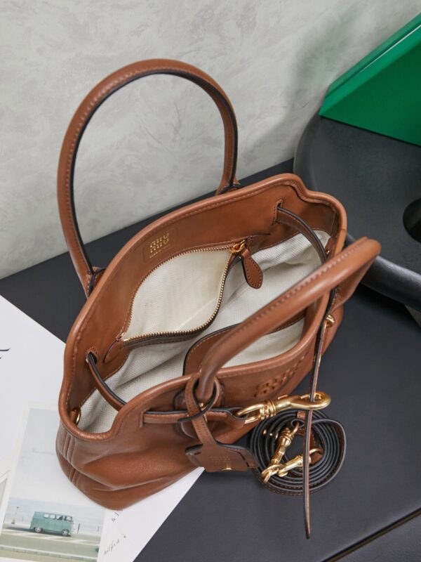 MIUMIU FROM THE RUNWAY Aventure nappa leather top-handle bag Medium