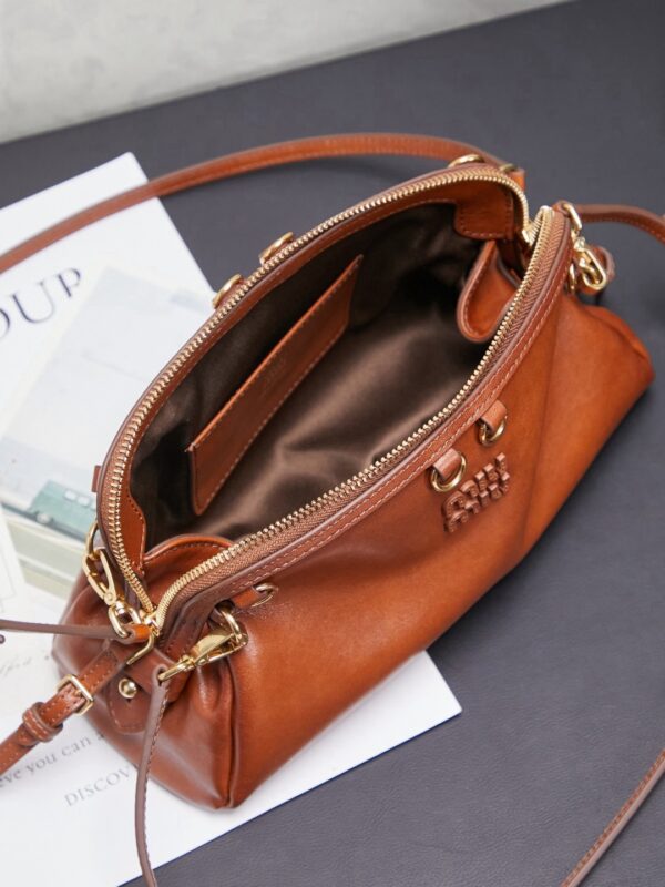 MIUMIU Caprice leather clutch