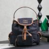 MIUMIU Canvas and leather backpack