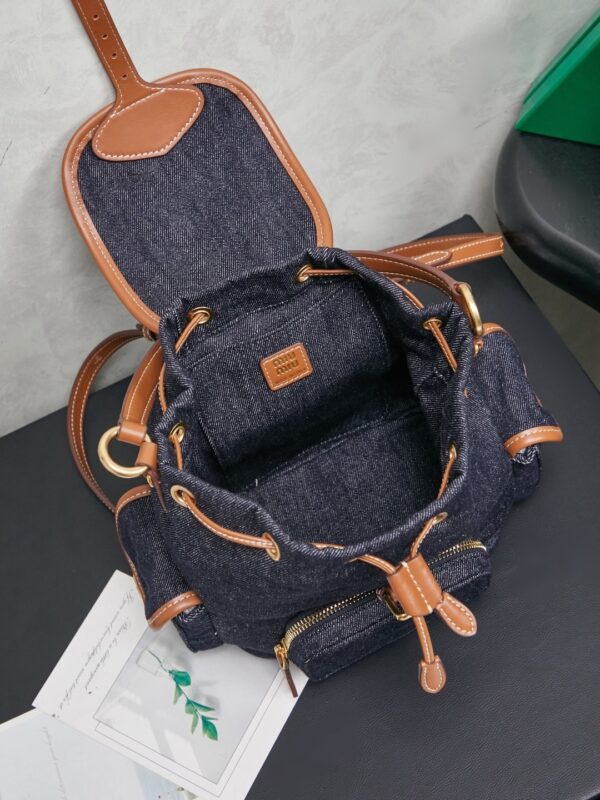 MIUMIU Canvas and leather backpack