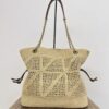 YSL JAMIE SHOPPING in raffia in Beige