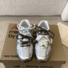 MIUMIU NB 530 SL metallic leather and mesh sneakers