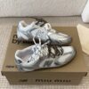 MIUMIU NB 530 SL metallic leather and mesh sneakers