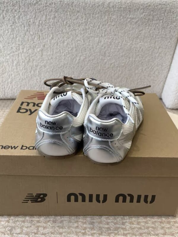 MIUMIU NB 530 SL metallic leather and mesh sneakers